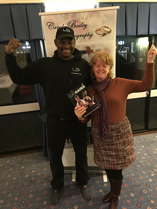 photographer holding lean gains book